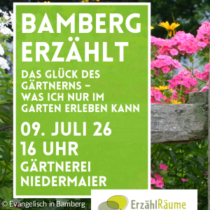 Blumen hinter einem Gartenzaun